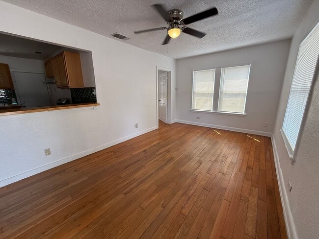 Photo - Charming 3BR Home w/ Hardwood Floors, Large Kitchen & Private Fenced Yard
