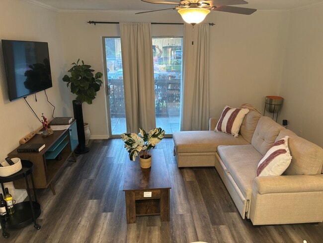 Living room - 9100 Dr Martin Luther King Jr St N Unit First Floor Condo