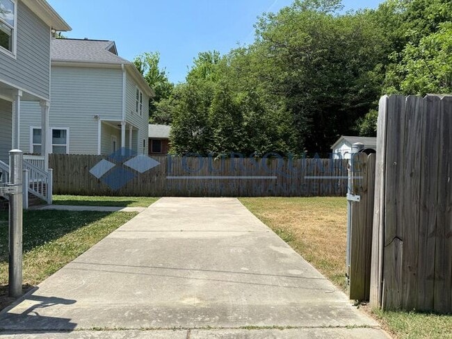 Photo - Modern 3-Bed / 2.5-Bath Home with Granite Kitchen, Fenced Yard & Private Balcony – Walkable to Do...