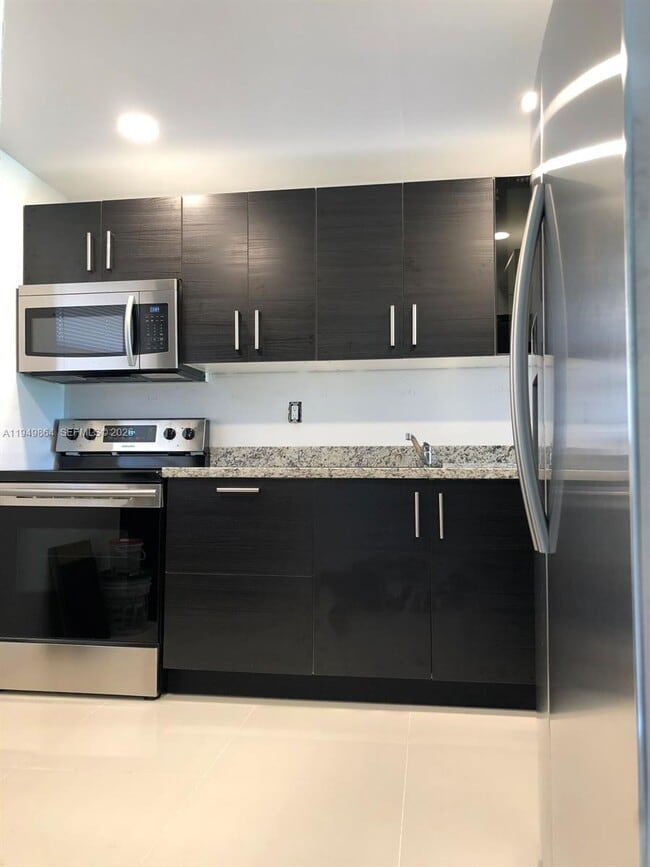 Building Photo - 8879A Fontainebleau Blvd Unit 105