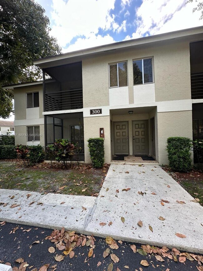 Building Photo - 300 Gardens Dr Unit 201