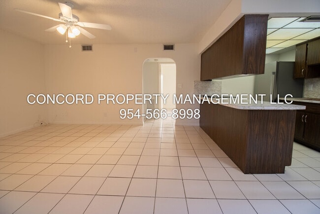 Photo - Spacious 2 Bedroom, 1 Bathroom- Pool - Laundry on Site- Fully Tiled- Central AC Unit 3
