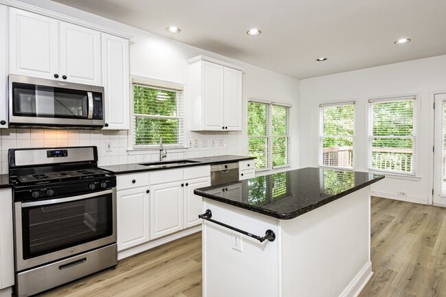 Photo - Beautifully Renovated Single-Family Home on a Quiet Cul-de-Sac New LVP Flooring · Professionally ...