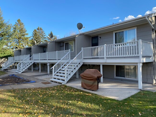 Concrete under deck which keeps it cleaner around the property - 3709 229th Ln NW Unit 1