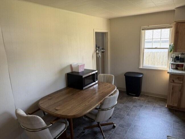 Photo - 3 bedroom, 1 bath. Large yard with large storage shed.