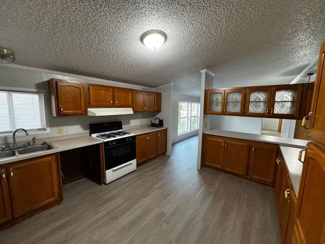 Photo - Very large yard great location a nice older doublewide Home