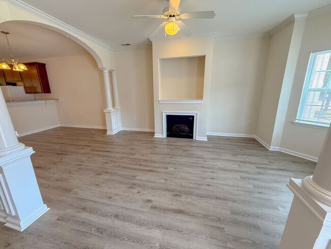 Photo - Beautifully updated Townhome! New cabinets, granite counter tops, and LVP flooring through downst...