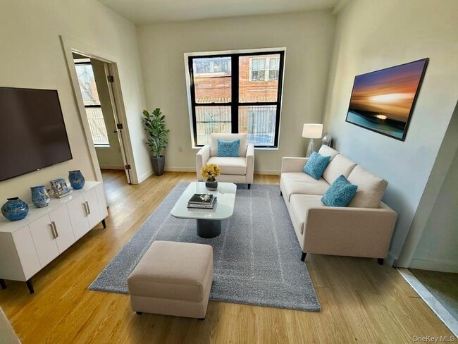 Building Photo - 2720 Decatur Ave Unit 4