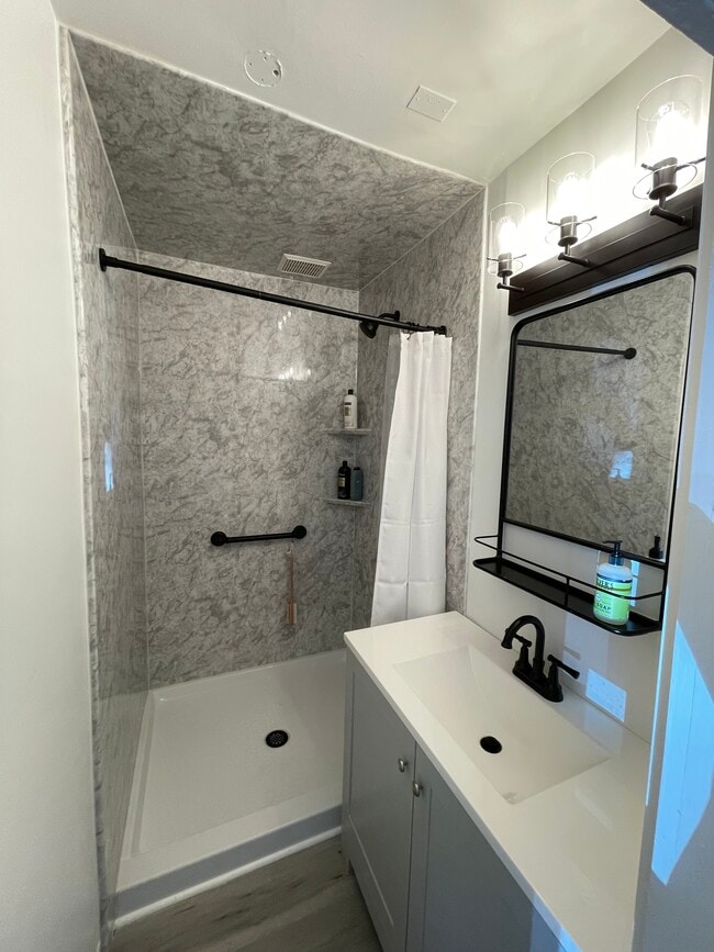 Newly renovated bathroom - 1437 Quarry Ave NW Unit Spacious 2-bed 1 bath