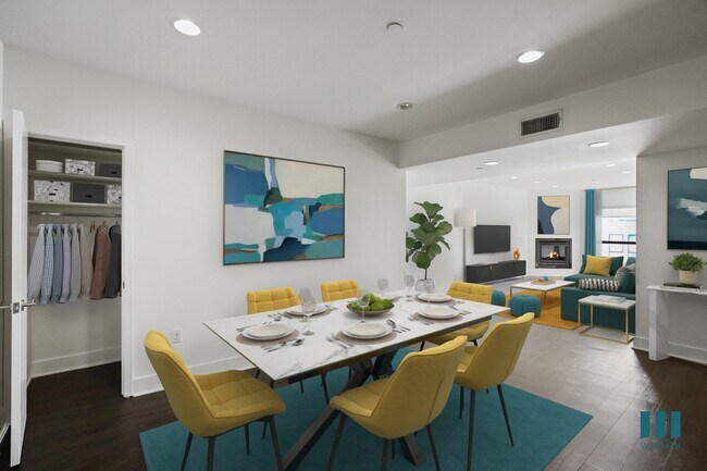 Comedor y sala de estar con armario de pasillo, chimenea, pisos de vinilo e iluminación empotrada. - Darlington Center by Wiseman