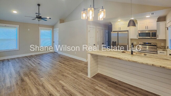 Photo - Spacious open floor concept 3-bedroom 2 bath.  Corner lot.  Newly built and conveniently located ...
