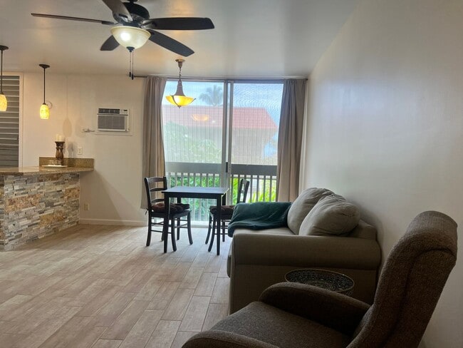 Building Photo - One bedroom semi-furnished bottom floor condo Unit B113