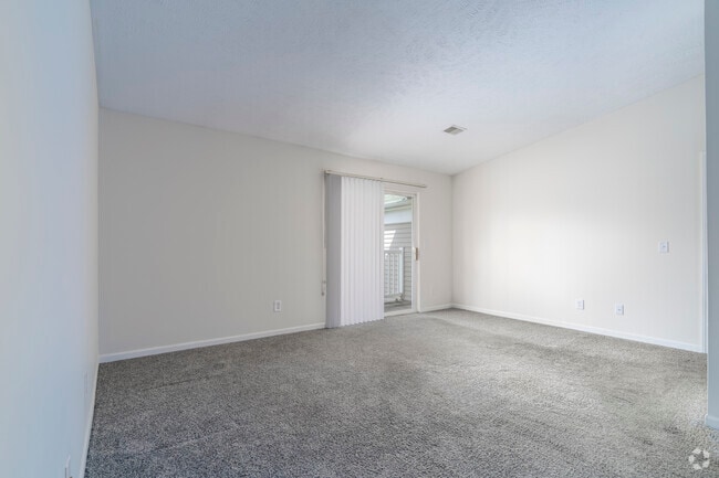 Cathedral Level - 2BR, 2BA - 1,000SF - Living Room - Tammany on the Ponds Apartments