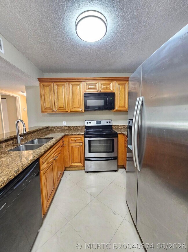 Photo - 1440 Windorah Way Unit C