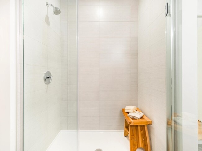 A clean, modern shower with sleek finishes and a calming, spa-inspired feel.