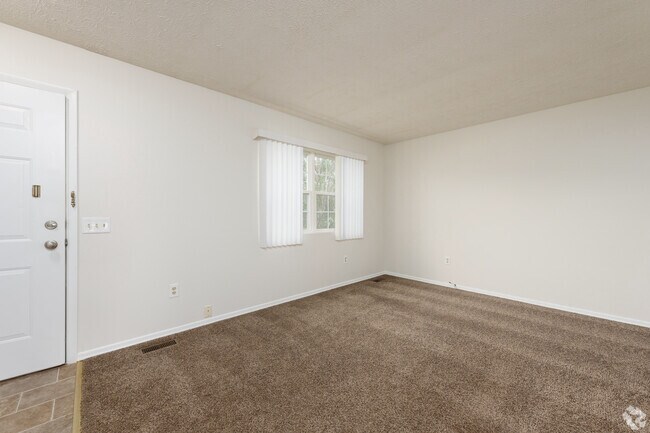 2BR, 1BA - 1,074SF - Living Room - Crystal Commons Townhomes