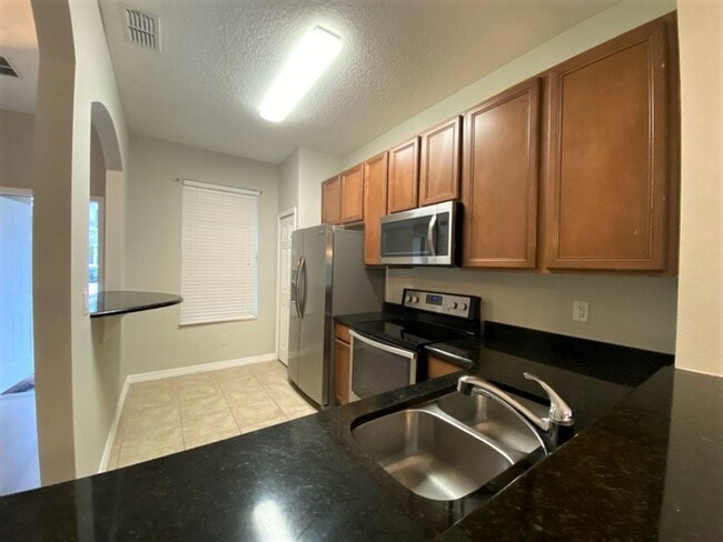 Photo - Gorgeous End Unit Townhome in Grande Champions!
