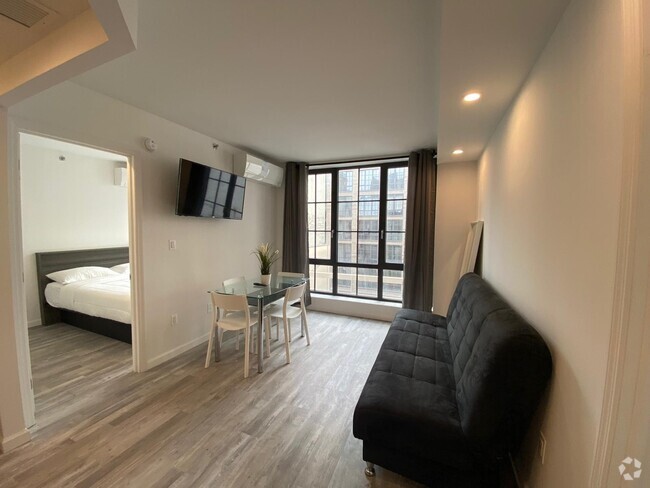 Building Photo - 433 W 53rd St Unit 4D Rental