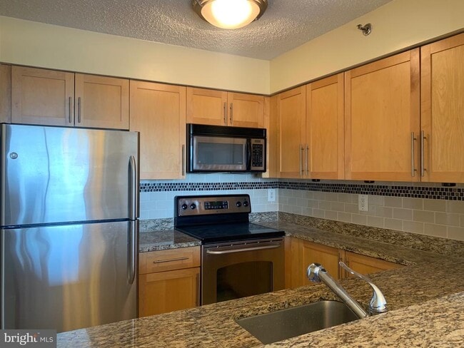 Photo - 10101 Grosvenor Pl Unit 2004