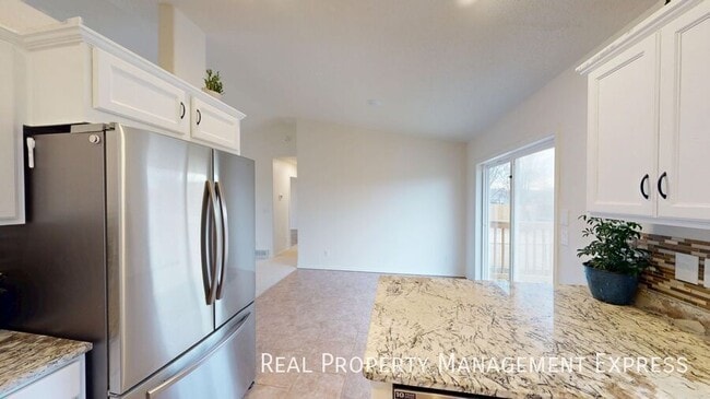 Photo - Stunning 4-Bedroom 2-Bathroom Home with Fully Fenced Yard