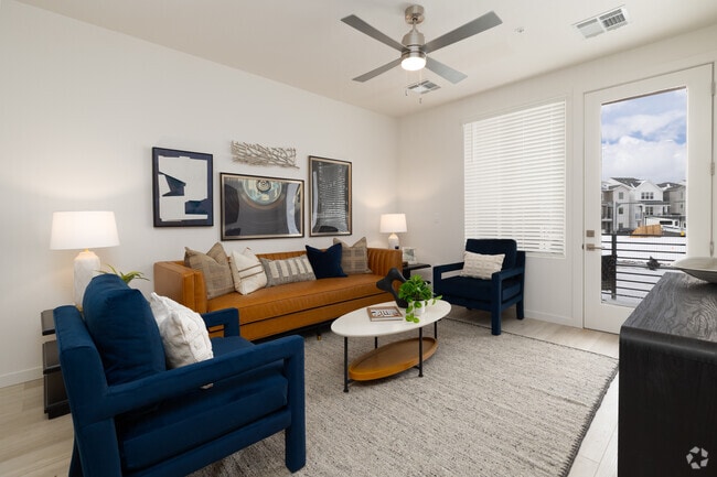 2 habitaciones, 2 baños - 1101 pies cuadrados - Sala de estar - Residences at Victory Ridge