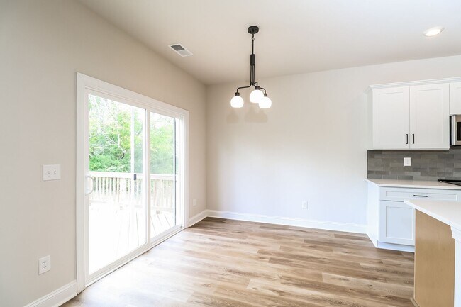 Photo - Beautiful 4BR 2.5BA Home w/ Full Appliance Kitchen • Garage Parking •