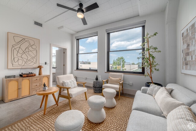 1BR, 1BA - 691SF - Style A - Living Room - Life At Agora