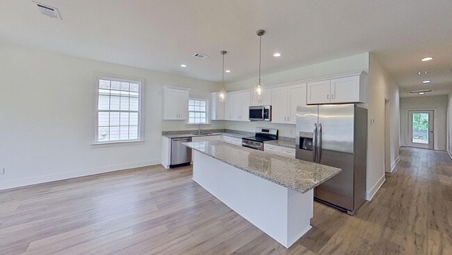 Photo - New build! 3/2 with backyard storage shed