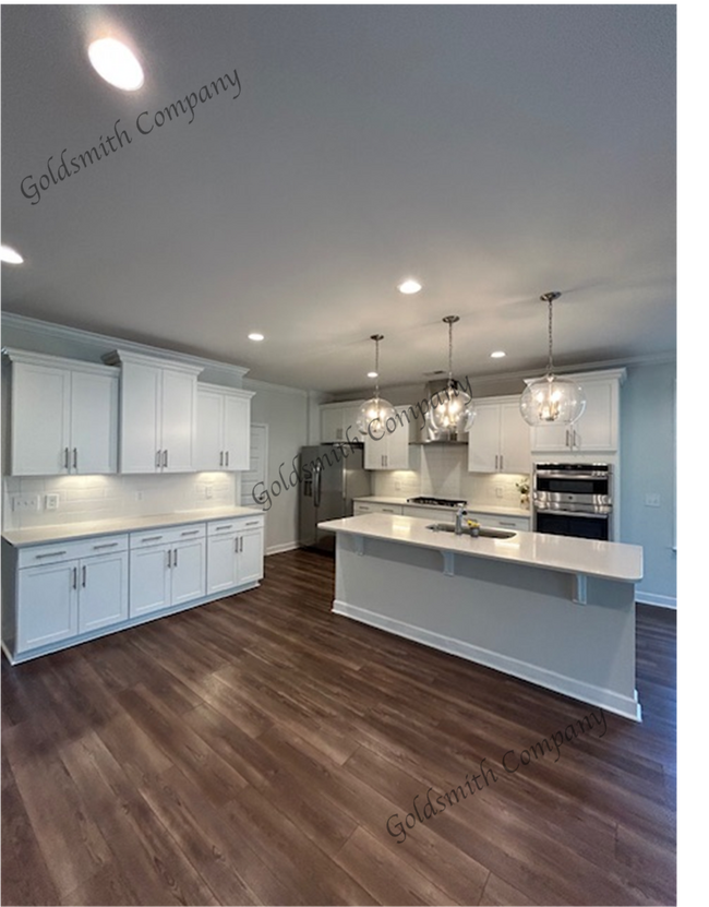 "Spacious Elegance Awaits: 5-Bedroom, 4.5-Bath Gem on Plumblee Lane!"