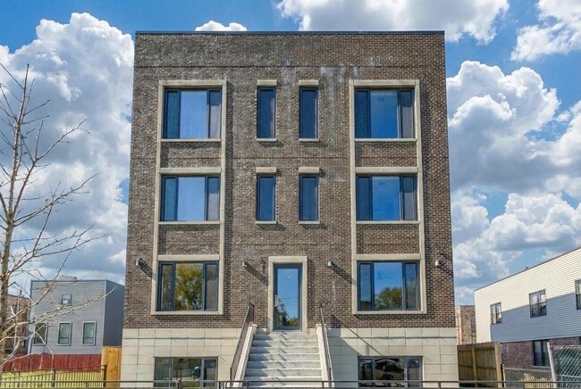 Building Photo - 4846 S St Lawrence Ave Unit 102