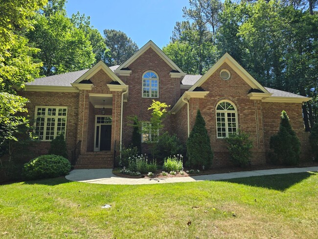 Building Photo - Custom Brick Home on Private Wooded Lot in Cary's Prestigious Wessex Community