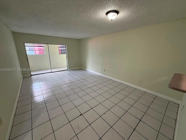 Building Photo - 6070 W 19th Ave Unit 112