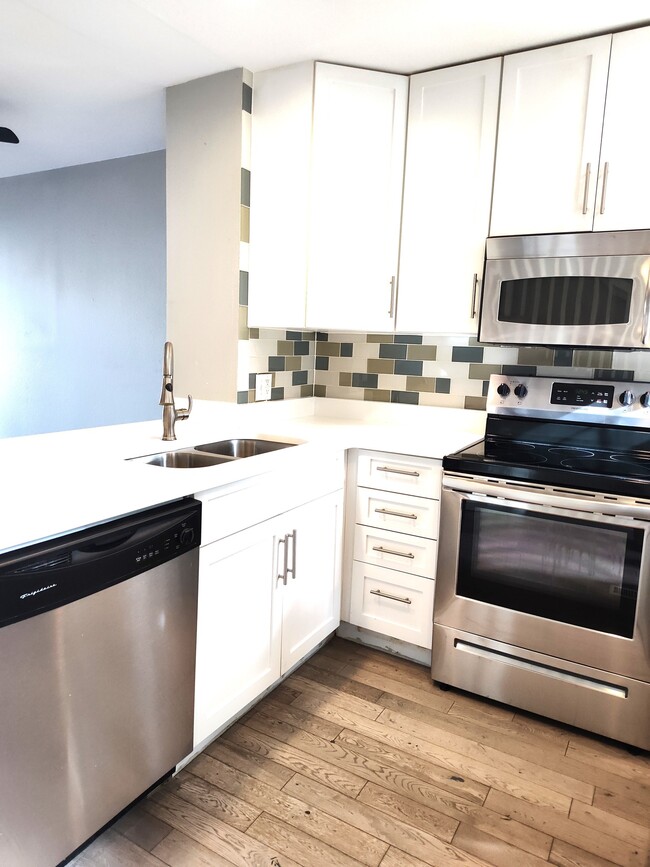 Kitchen and stainless steel appliances - 1811 S Quebec Way