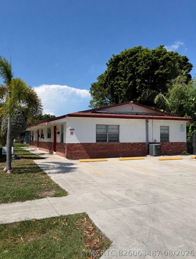 Building Photo - 2851 NW 11th Pl Unit 1-3