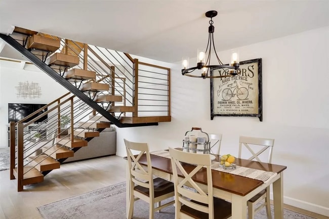 Photo - Spacious 1,550 Sq Ft Townhome | 2-Car Garage & High Ceilings w/ Exposed Beams