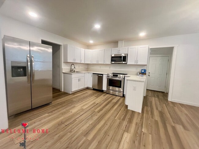 Photo - 4 bedroom home with air conditioning - Great location!!!  HUGE basement for your man cave or she ...