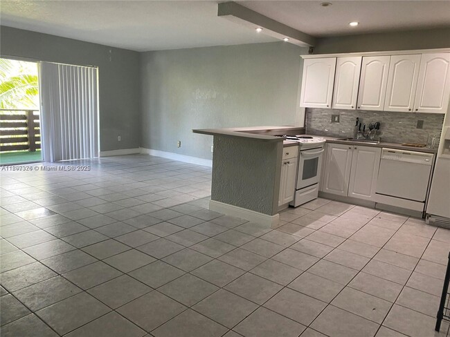 Building Photo - 7487 SW 82nd St Unit C309
