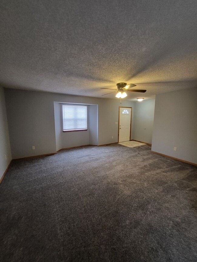 Photo - 3 Bedroom 2 Bath Duplex.  1 Car garage.  Maintenance Free We Mow!