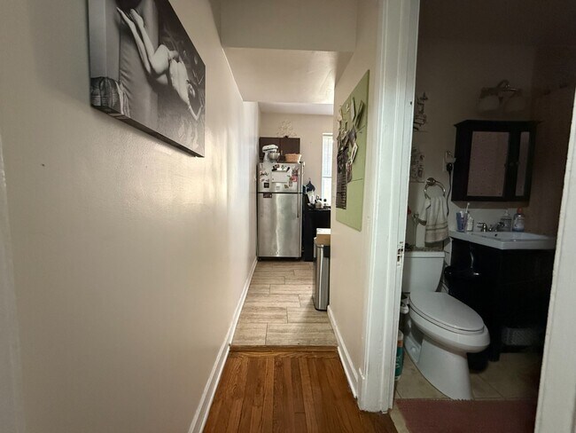 Photo - Rogers Park 2 Bed 1 Bath With Central AC & Heat, Beautiful Sunroom, Dog Friendly, Available July ... Unit 2