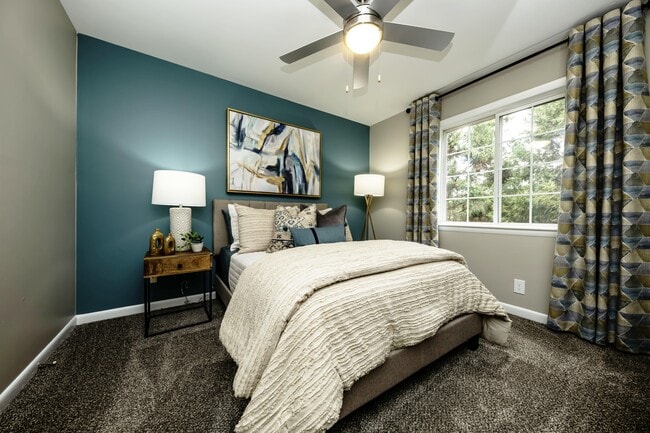 Cozy bedroom suite with ceiling fan