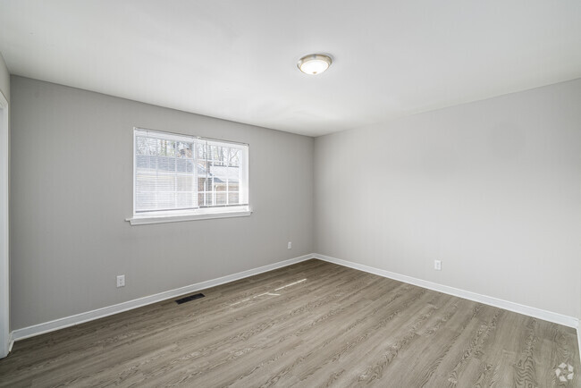 2BR, 1.5BA - 1,034SF - Primary Bedroom