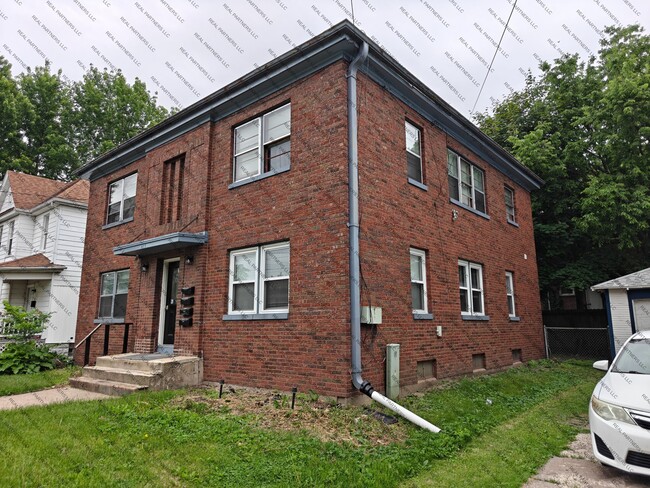 Building Photo - 417 W 14th St Unit 4