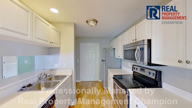 Photo - Spacious Upper Level Condo w/Open Floorplan and Split Bedrooms Unit G
