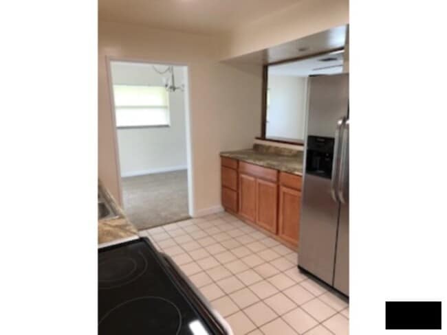 Photo - Large Corner Lot, Fenced in Yard, New Flooring, Fresh Paint, Lawn Care Included!