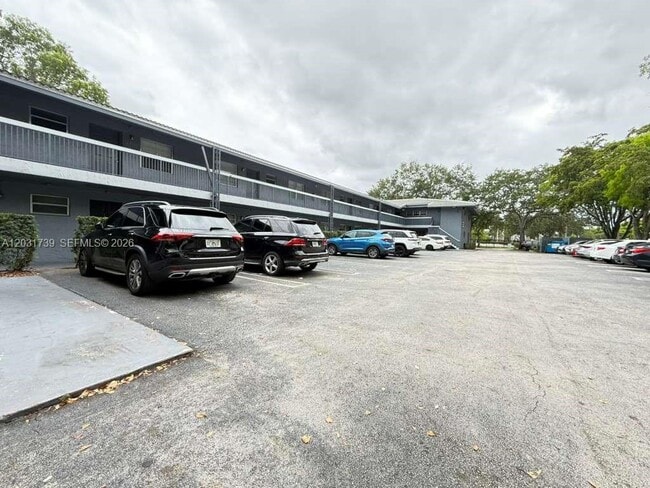 Building Photo - 8982 W Sample Rd Unit 204
