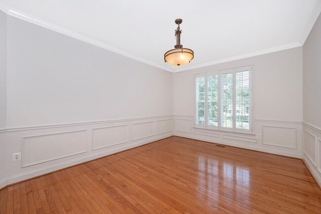 Photo - Main Level Primary Suite & Soaring Two Story Family Room