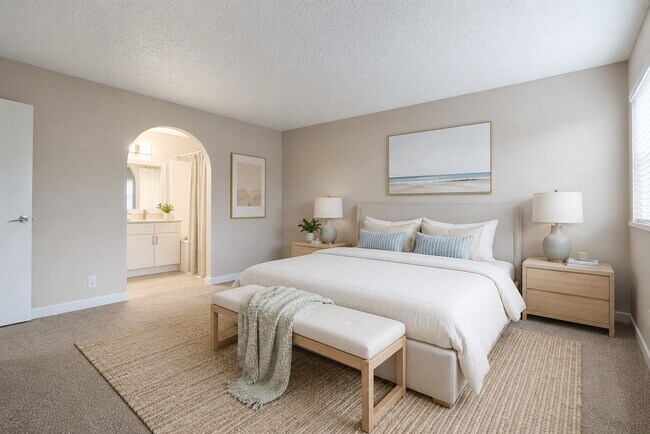 Step into elegance at Invitational, where modern design meets comfort. This spacious bedroom features serene colors and stylish furnishings, creating the perfect retreat. Ready to elevate your living experience? Inquire today!