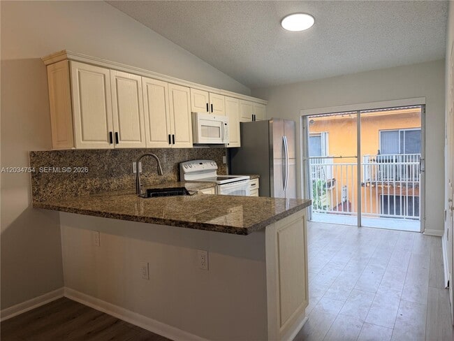 Building Photo - 7730 W 34th Ln Unit 14-202