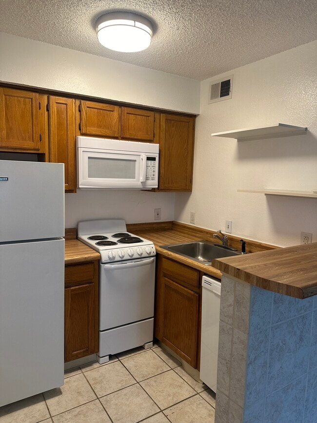 Building Photo - 2301 Basil Dr Unit F302