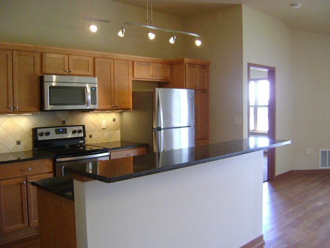 Stainless appliance with granite counter tops - Hillstone Apartments